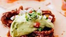 BEEF BIRRIA TACOS WITH AVOCADO CREMA AND JALAPENO RELISH