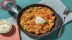 Cajun Chicken Dirty Rice with Peas and Soured Cream