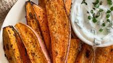 Citrusy Garlic Sweet Potato Wedges with Garlic & Herb Yogurt Dip