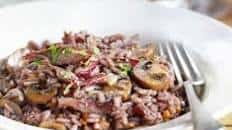 Red wine risotto with duck & garlicky mushrooms Thumbnail