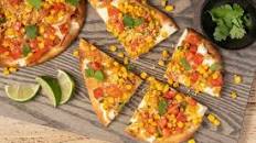 Elotes-Style Pizza with lime crema