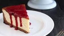 New York Style Cheesecake with Raspberry Sauce