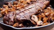 Pan Seared New York Strip Steak with Garlic Butter Sauce, Onions & Mushrooms