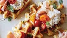 Savory Cheesy Herb Waffle Topped with Burrata, Tomato and Prosciutto