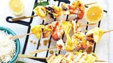 Seafood and pineapple skewers with coconut-curry sauce