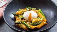 Spicy Vegetable Tteokbokki with Asparagus, Soft-Boiled Eggs & Ginger Cashews