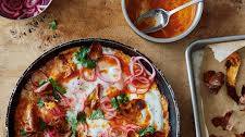 The Ottolenghi Test Kitchen’s Sweet Potato Shakshuka with Sriracha Butter and Pickled Onions