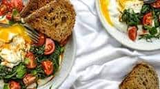 Turkish Eggs With Greek Yogurt and Sautéed Spinach