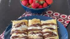 Crepes with Strawberries & Chocolate Drizzle