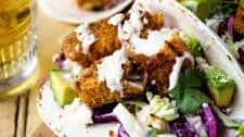 Crispy Baked Fish Tacos with Creamy Cilantro Lime Slaw
