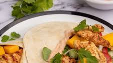 Grilled chicken wrap with mango and spicy mayo