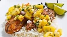 Jerk Fish on Coconut Rice Topped with Banana and Pineapple Salsa