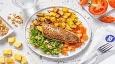 Pan-Seared Sea Bass and Warm Tomato Salsa with Rosemary Potatoes and Pesto Pea Shoot Salad