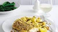 Pesto-crusted cod with garlic roast potatoes