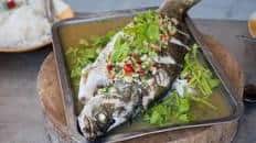 Steamed Fish With Lime and Garlic Recipe (ปลากะพงนึ่งมะนาว)