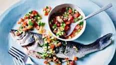 Whole sea bass with warmed tomato and citrus salsa