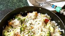 HERB RICE WITH BROCCOLI, PEAS AND PEPPERS