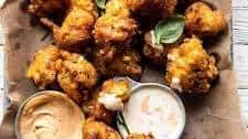 Jalapeño Garlic Corn Fritters with Chipotle Aioli.