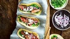 Lamb tacos with minted pea guacamole