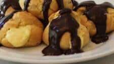 Profiteroles with Custard Cream and Chocolate Sauce