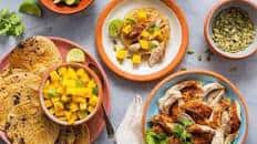 Smoky shredded-chicken tacos with mango salsa