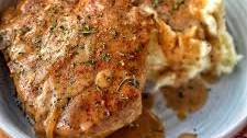 Smothered Pork Chops with a Black Pepper and Paprika Gravy