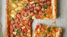 Tomato and herbed cheese puff pastry tart
