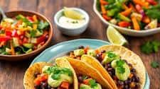 Veggie Delight: Colorful Black Bean Tacos with Avocado Crema