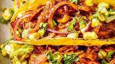 BBQ BRAISED CHICKEN TACOS WITH AVOCADO CORN SALSA
