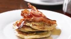 Banana pancakes with crispy bacon & syrup