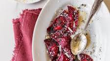 Beetroot fresh pasta with ricotta, walnuts, and thyme