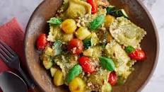 Caprese three-cheese ravioli with pesto and cherry tomatoes