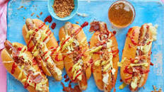 Cheesy hot dogs with pickle mustard sauce & crispy onions