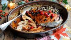 Cranberry-glazed roast turkey breast with wild rice stuffing