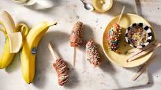 Frozen Chocolate covered banana pops with (colored) sprinkles