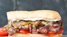 Grilled Flank Steak Sandwiches with Caramelized Onions and Mushrooms