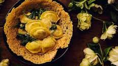 Mozzarella Cheese Ravioli with basil in a Parmigiano Basket