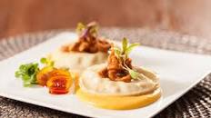 Mushroom Duck Confit Ravioli with Roasted Butternut Squash Puree and Blood Orange Reduction