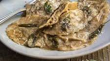 Mushroom pesto ravioli with sage butter sauce