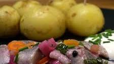 Onion pickled herring with chili