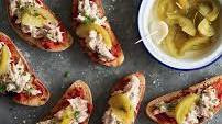 PICKLED GREEN TOMATOES, ’NDUJA & SMOKED KAHAWAI BRUSCHETTA