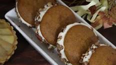 Pumpkin Whoopie Pies filled with Whiskey Cream Cheese and Candied Pecans