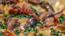RAVIOLI WITH MUSHROOM CREAM SAUCE