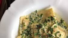 Ravioli in Creamy Garlic and Spinach White Sauce