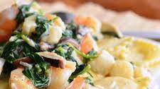 Ravioli with Seafood, Spinach & Mushrooms in Garlic Cream Sauce