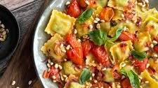 Spinach and ricotta ravioli with cherry tomatoes