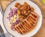 Sweet and Spicy Maple Pork Chop with red cabbage slaw and roasted potatoes