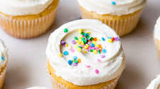 Vanilla Cupcakes with Whipped Vanilla Frosting
