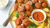 Veggie packed meatballs in red sauce