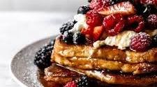 Brioche French Toast Topped with Berries and Whipped Cream